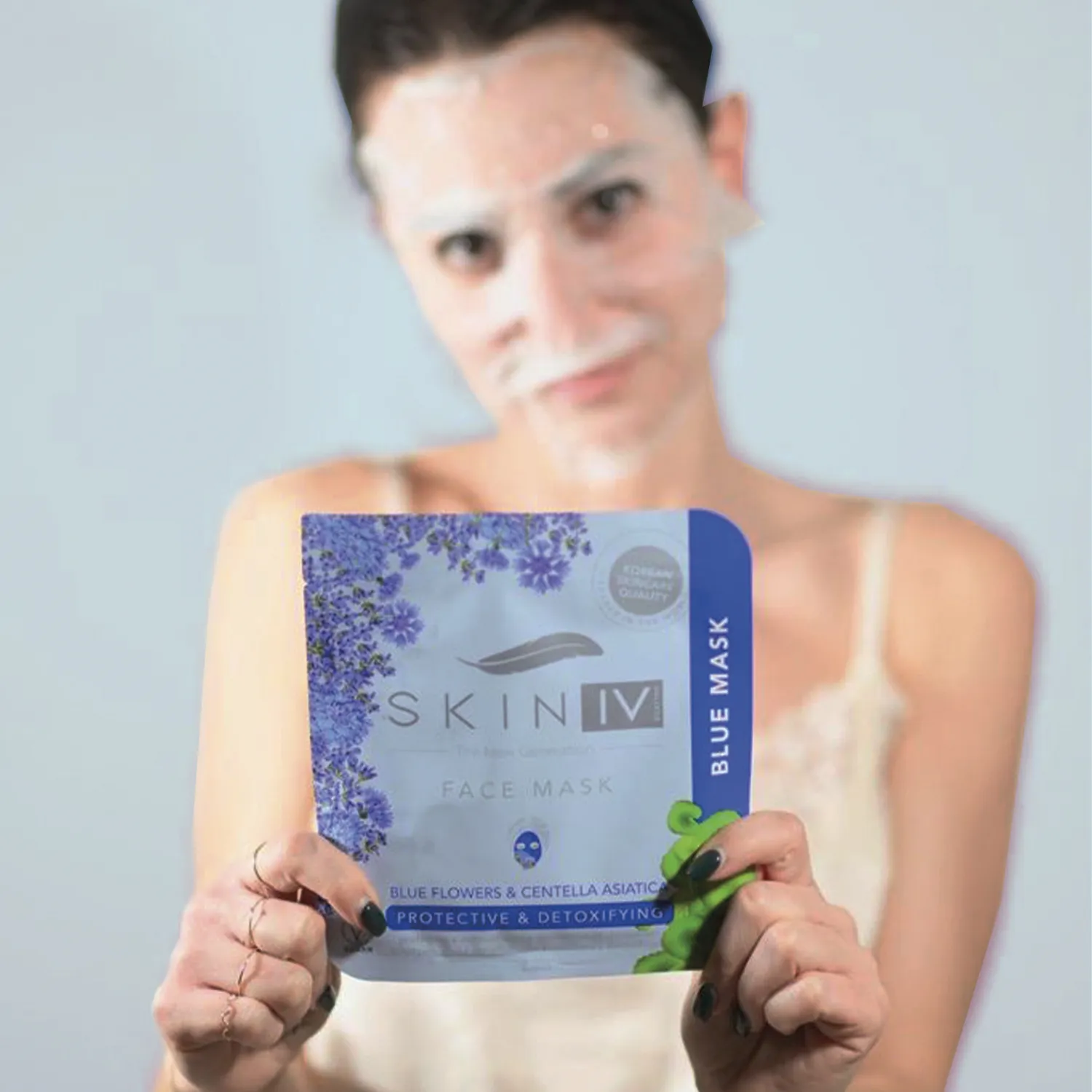 Skin Iv Antismog Detossinante maschera viso fiori blu